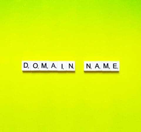 Scrabble pieces spelling out domain name