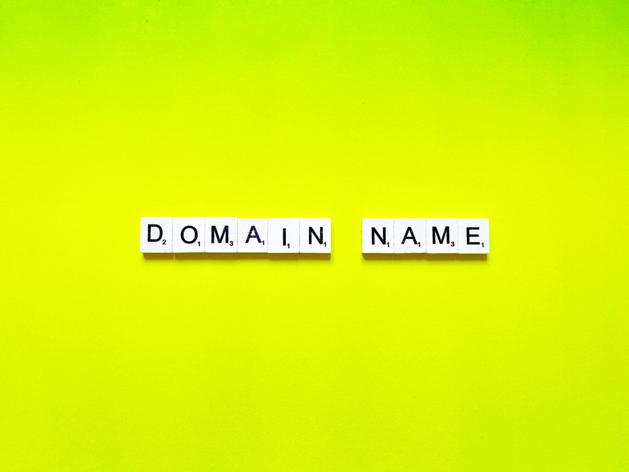 Scrabble pieces spelling out domain name
