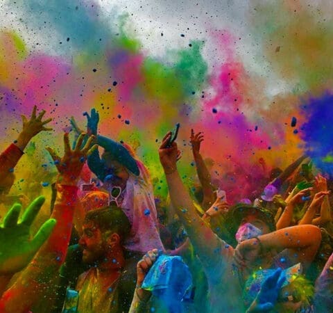 happy-people-drenched-in-bright-colors-celebrating
