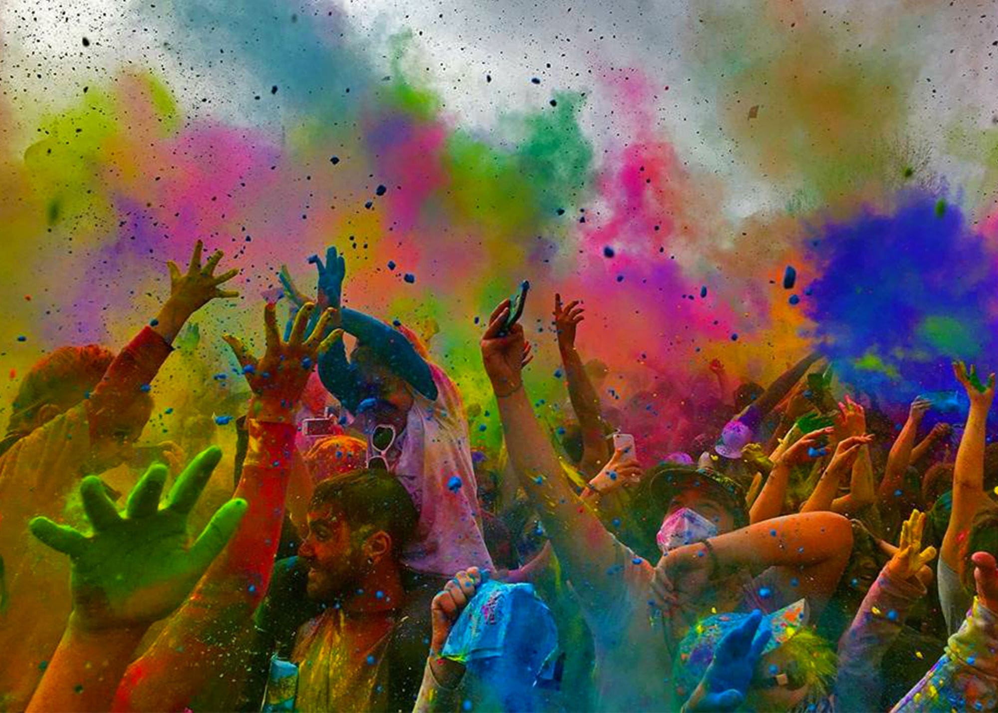 happy-people-drenched-in-bright-colors-celebrating